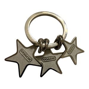 Coach NWOT Metallic Star Charm Key Ring with Three Stars. Dustbag